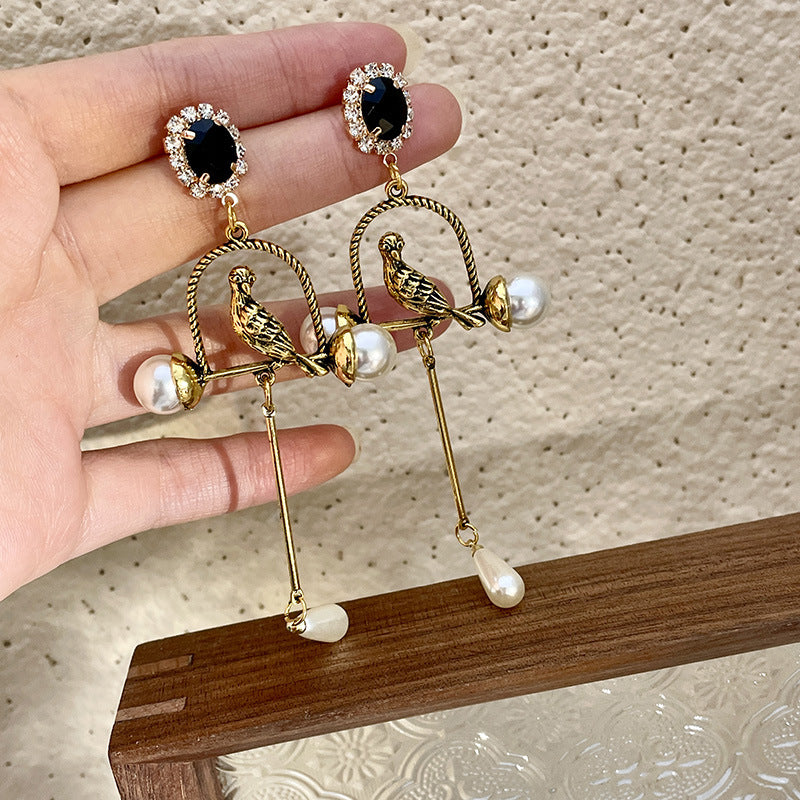 BIRD CAGE PEARL EARRINGS