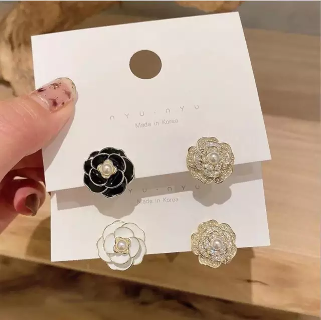 SHINE FLOWER STUDS