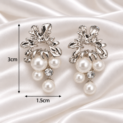 SILVER PEARL STUDS