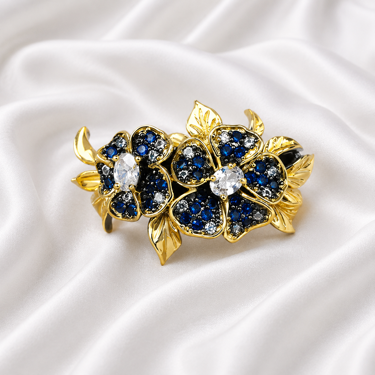 BLUE HUE ZIRCON FLOWER RING