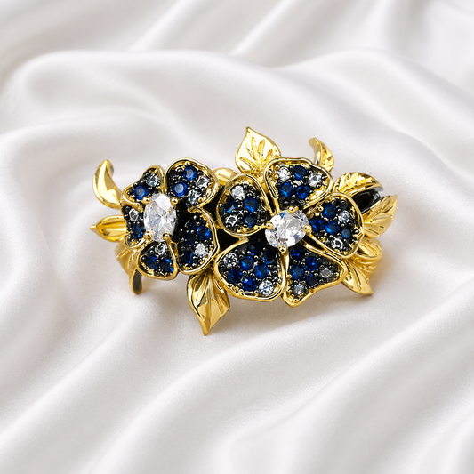 BLUE HUE ZIRCON FLOWER RING