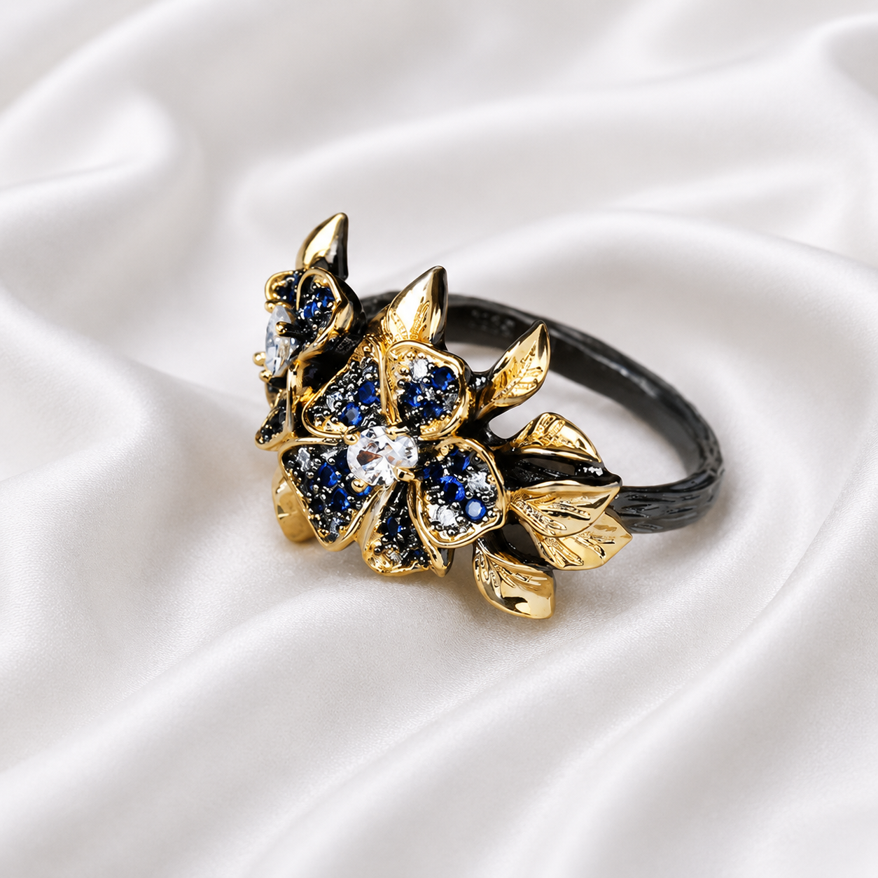 BLUE HUE ZIRCON FLOWER RING